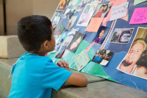 kid looking at collage image