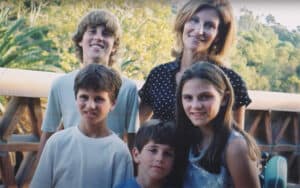 Widowed Mother with 4 kids smiling again