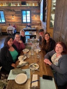 Alumni at a table in a restaurant