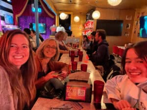 Alumni Leslie and Julia at a restaurant