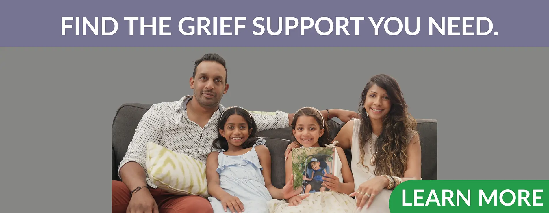 Find the Support you need. Image of family with mom, dad and two young children sitting on a couch.